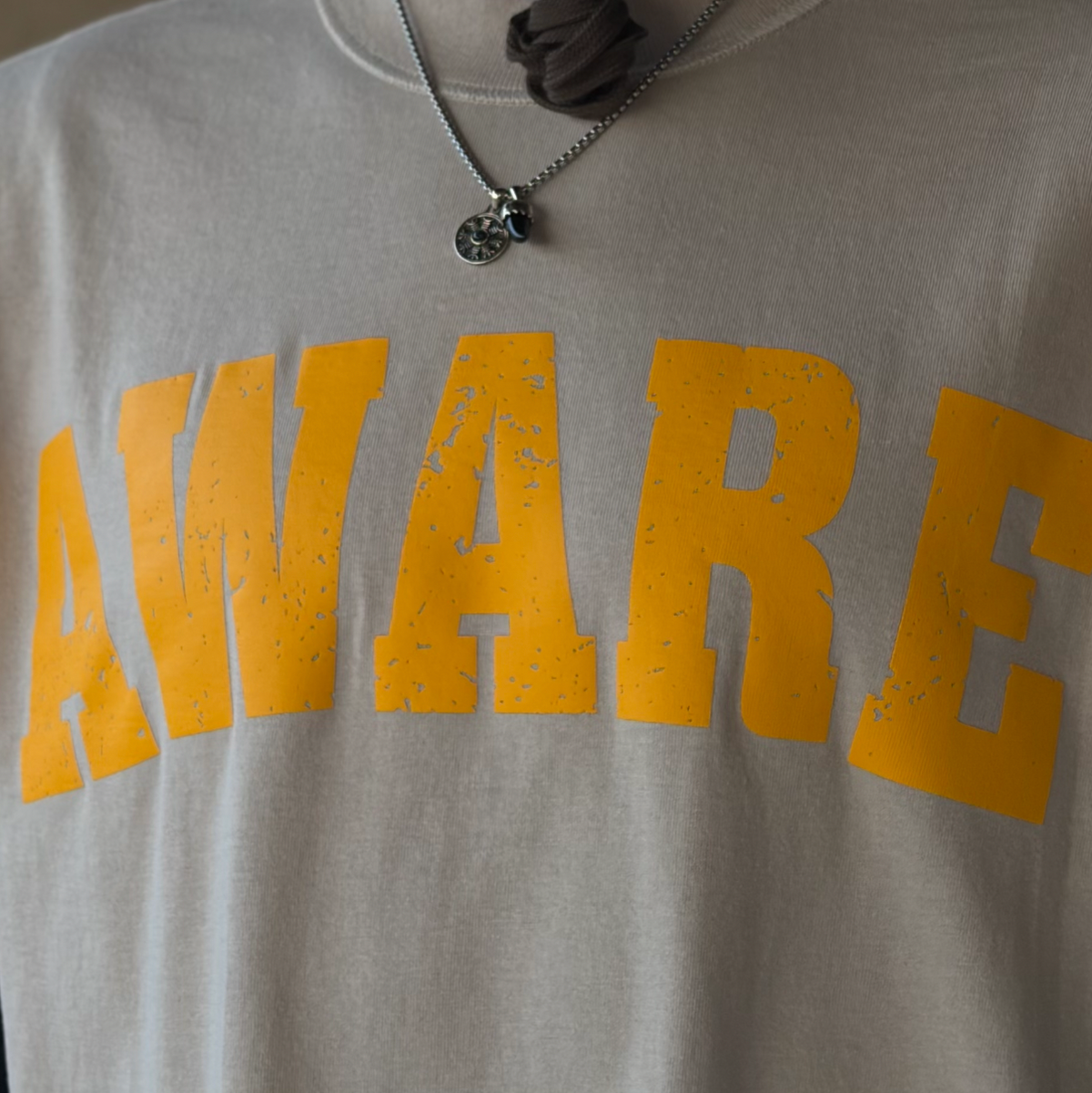 TAN AWARE TEE 'MARIGOLD'